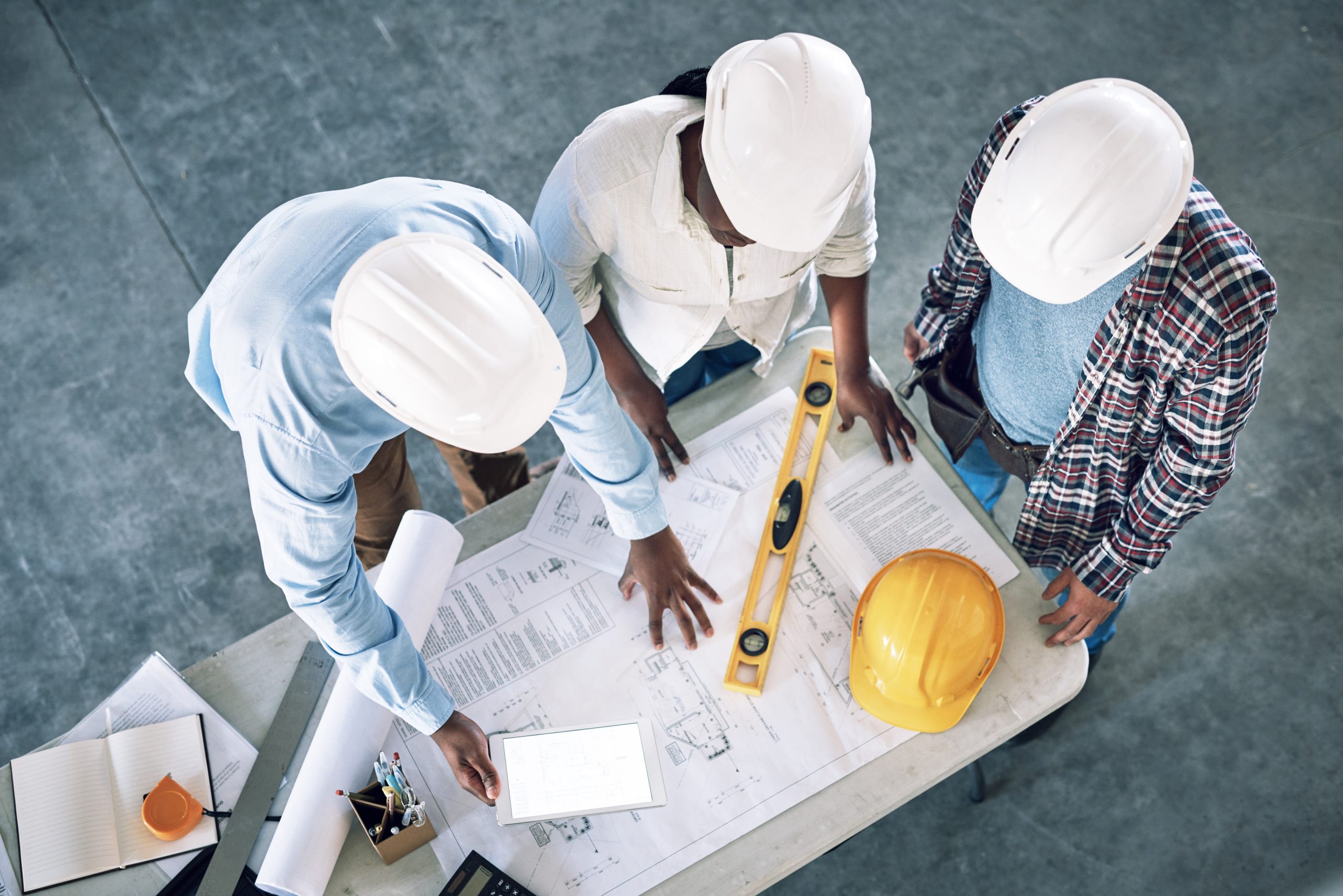 Taking Clients Designs Level Shot Group Builders Having Meeting Construction Site Scaled